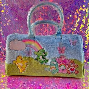 COPY - Dolls Kill Care Bears Faux Fur Rainbow Weekender Bag